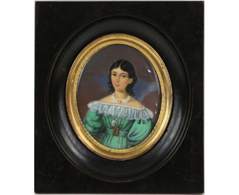 Oval portrait miniature depicting a young woman in a green dress and pearl necklace, signed Corvert pinx. 1831, 8.5cm x 7cm,.