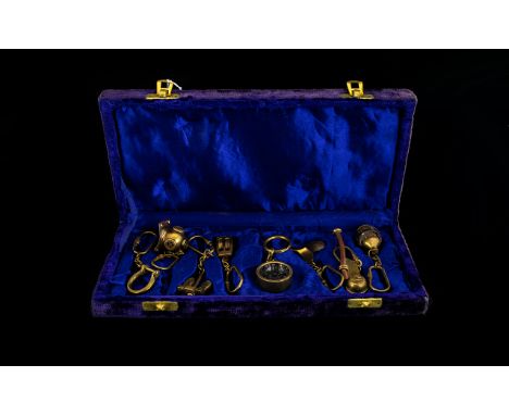 Nautical Interest A Boxed Collection Of Novelty Keyrings Housed in fitted velvet lined box to include eight keyrings, all in 