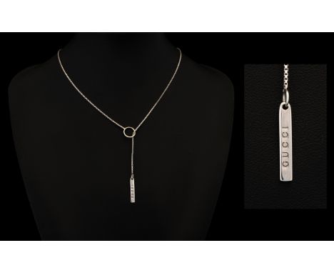 Gucci 18ct White Gold Lariat Necklace Box chain comprising slim rectangular pendant with 'Gucci' impressed logo, and loop thr