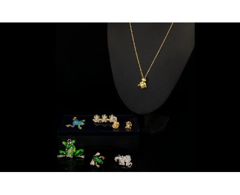 A Collection Of Frog Themed Costume Jewellery Items Eight pieces in total to include blue enamel leaping frog brooch, gold to