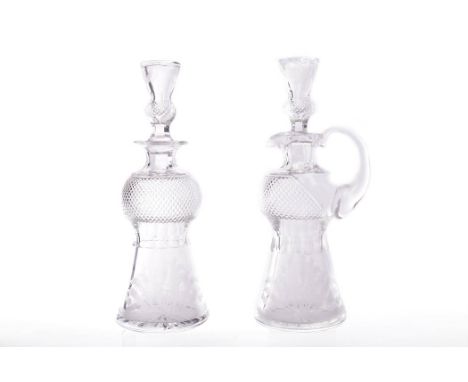 SET OF EDINBURGH CRYSTAL DECANTER AND CLARET JUGstamped 'Edinburgh Scotland' to bases, both of thistle form, with diamond cut