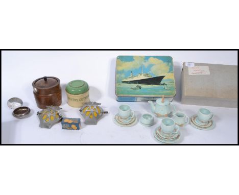A collection of vintage items to include a pair of vintage AA motoring car badges , a Huntley and Palmer miniature tin , Boat