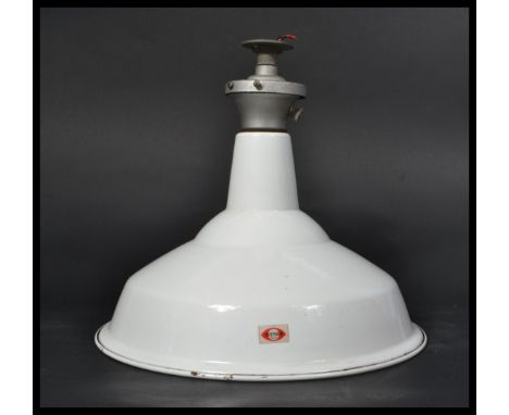 An early 20th century white&nbsp; enamel painted metal factory pendant light by Benzamin, bearing original label. Space age f