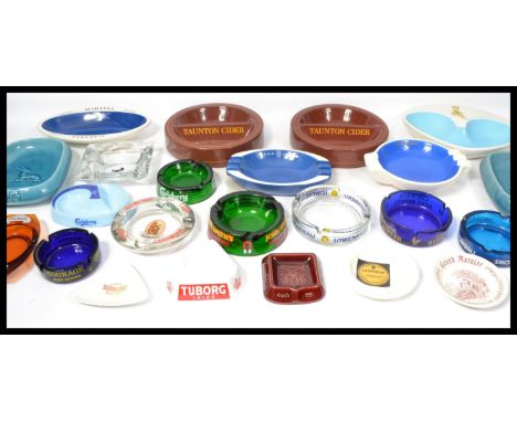 A collection of vintage 20th century advertising point of sale pub bar ashtrays to include Harp Lager , Carlsberg , Martell ,
