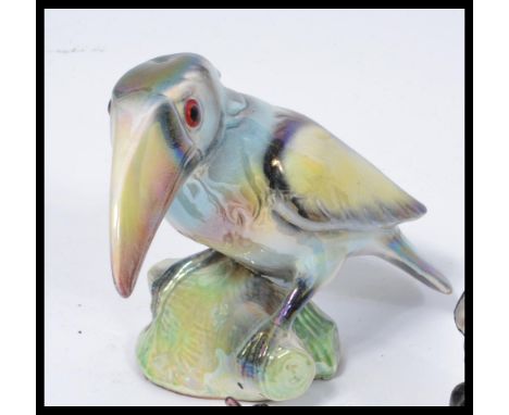 A collection of retro vintage 20th Century Kitsch items to include three cast metal graduating wall hanging ducks, lustre cer