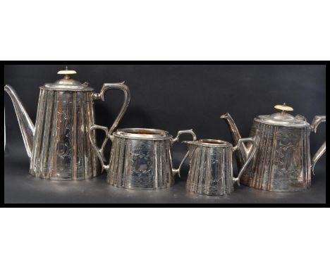 A vintage 20th Century silver plated four piece tea service consisting of teapot, water pot, sugar bowl and creamer each piec