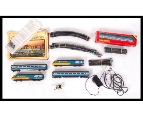 An original Hornby 00 gauge Intercity loose trainset with extra carriages. All loose, with boxed locomotive. Come with manual