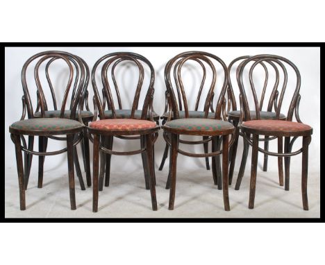 A set of 6 20th vintage Thonet style French bentwood cafe chairs / dining chairs. Raised on turned legs with upper peripheral