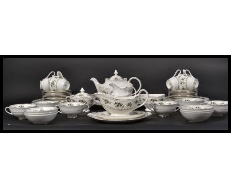 A Royal Doulton Valley Green dinner and tea service H5015 having platinum to include Sauce Boat, Soup Bowls, Meat Platter, Te