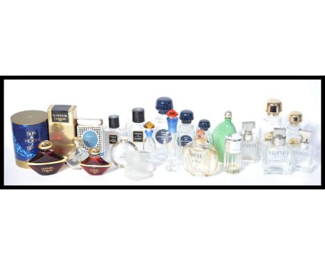 A collection of vintage 20th century perfume shop display miniature bottles to include , Chanel , Calvin Klein , some in orig