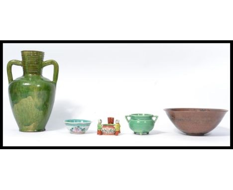 A group of Chinese ceramics and pottery to include a mottled green jade glazed twin handled vase , a small scalloped bowl , g