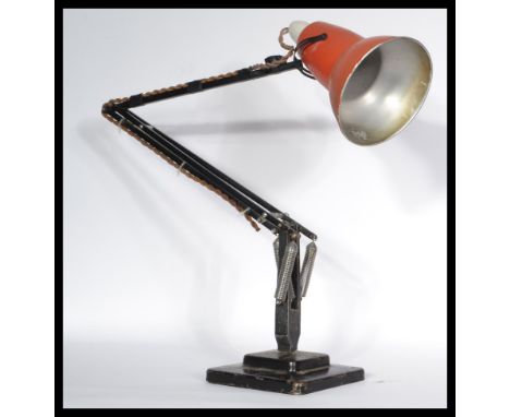 A vintage retro 20th century 1940's Industrial pre-war Herbert Terry anglepoise lamp, raised on a cast metal two step base wi