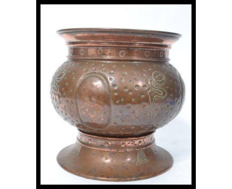 A stunning early 20th Century Arts and Crafts copper hand worked planter with marks to the base for&nbsp;Benham &amp; Froud. 