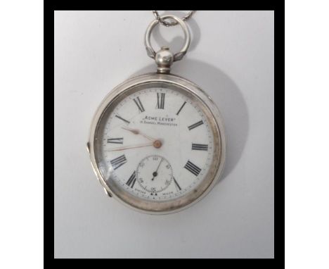 An early 20th century silver hallmarked ACME Lever pocket watch. The white enamel face having a Roman numeral chapter ring. S