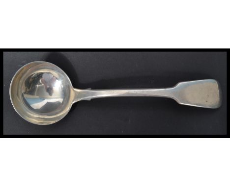 A hallmarked silver 19th century Georgian ladle in the fiddle pattern by Thomas Wallis (II) &amp; Jonathan Hayne. Hallmarked 