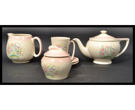 A vintage 20th century Susie Cooper Dresden Spray pink variation pattern part tea service consisting of the tea pot / teapot 