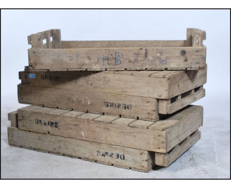 A collection of five  vintage 20th century wooden apple / fruit / potato storage / transportation crates, some with notation.