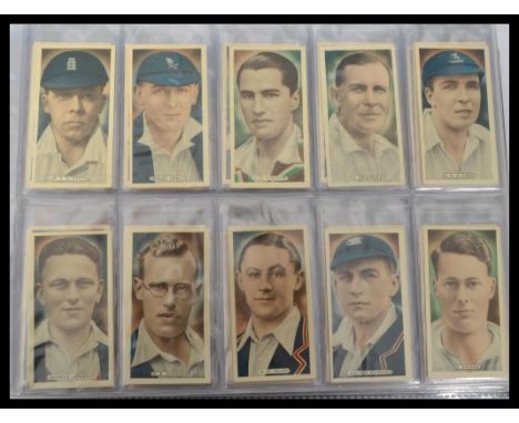 An album of vintage cigarette cards mainly full sets to include Ardath cricket tennis and golf celebrities , Wills cricketers