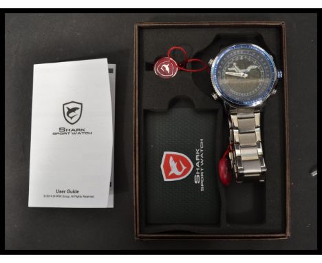 A contemporary boxed Shark Sports Watch Wing head model with alarm clock stop watch. Set to a stainless steel watch. Complete