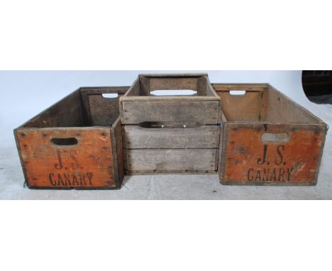 A group of three vintage 20th century wooden shipping crates with notation to sides. Please see images