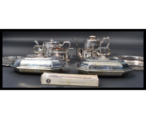 A collection of vintage early 20th Century silver plated items to include a tea service, lidded tureens, salvers etc. Highest