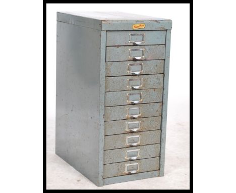 A vintage / retro 20th Century industrial ten drawer metal filing cabinet in original finish with applied makers label for Sh