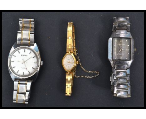 A group of three vintage 20th century watches to include a Chicks 17 jewel stainless steel watch , Lorus gold plated watch an