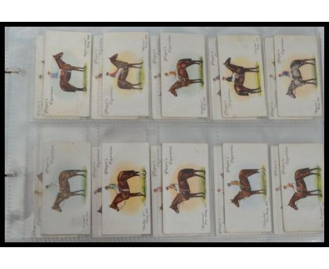 An album of vintage cigarette cards mainly full sets to include Players Derby and Grand National winners , Football caricatur