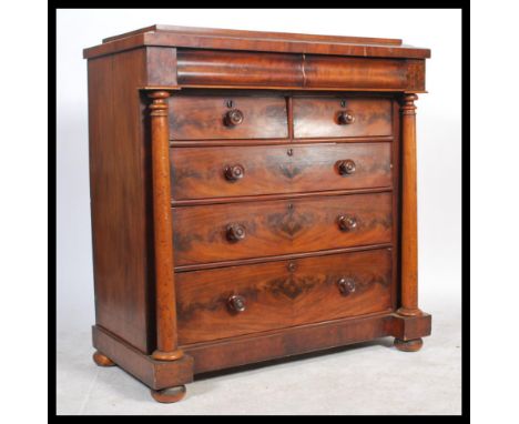 A Victorian 19th century mahogany Scottish caddy top chest of drawers. The large chest with short and deep drawer configurati