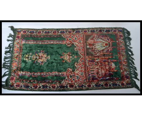 A vintage early 20th century North African prayer rug mat on red ground with green mihrab&nbsp; together with a set of hide c