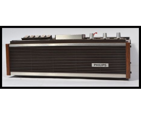 A retro 20th Century circa 1970's teak cased Phillips reel to reel four track 4307 tape player / recorder. When closed measur