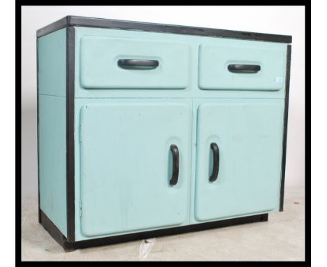 A vintage mid 20th Century enamel topped two tone kitchen two drawers above aluminium cupboard doors