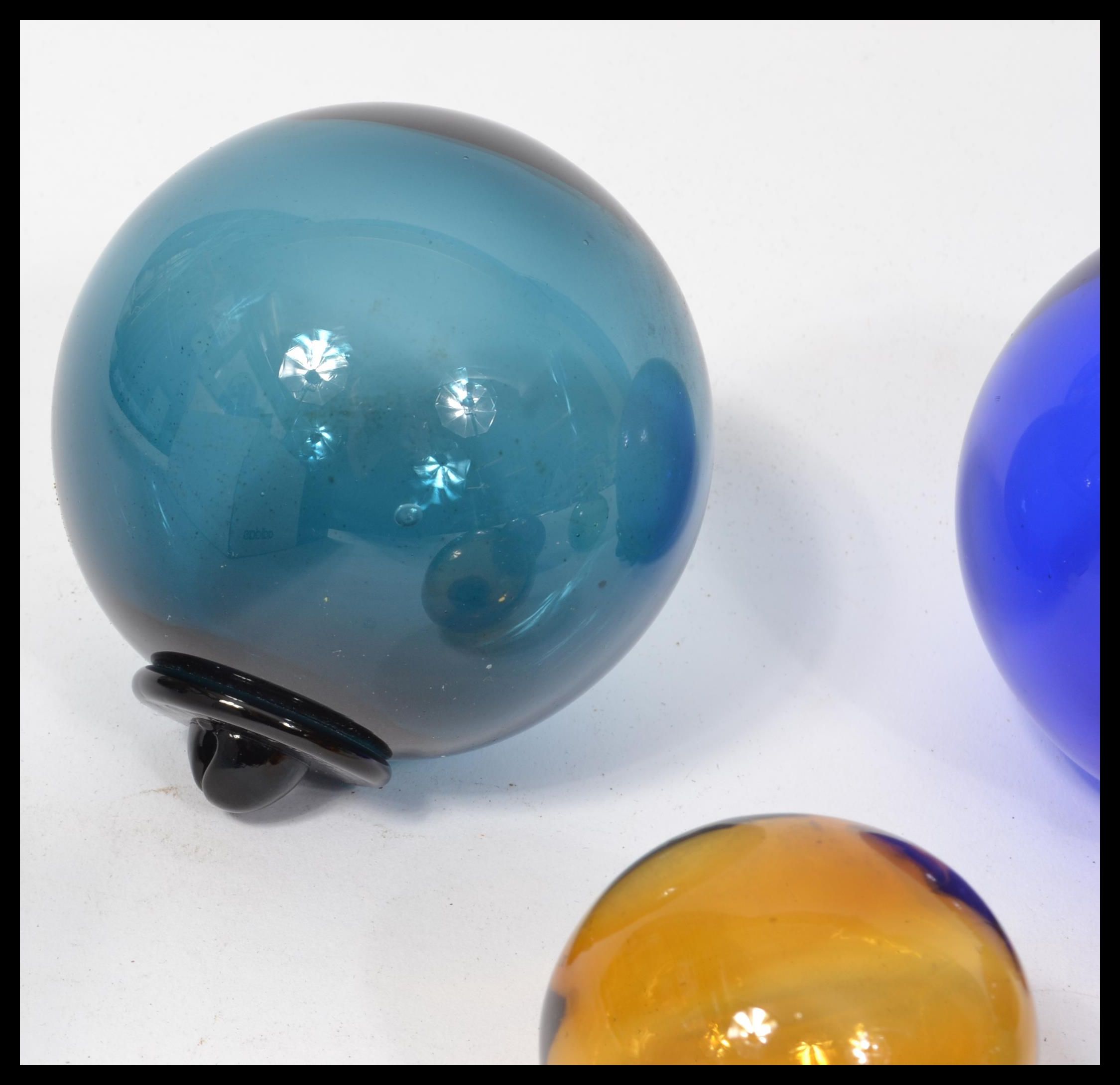 a-group-of-six-vintage-20th-century-witches-balls-each-coloured-glass