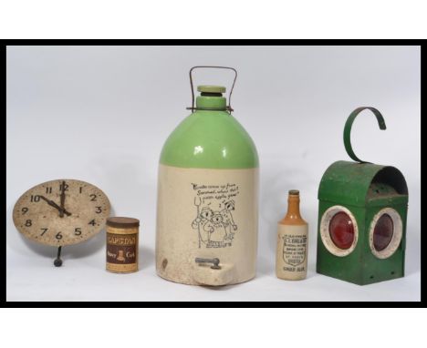 A group of vintage items to include a Smiths wall clock , cider stoneware flagon , Geopi railway lamp , Capstan Tobacco tin e
