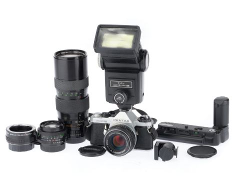 silver, serial number 2626775, body G-VG, light usage marks on bottom plate, shutter works, internal LEDs work, metering resp