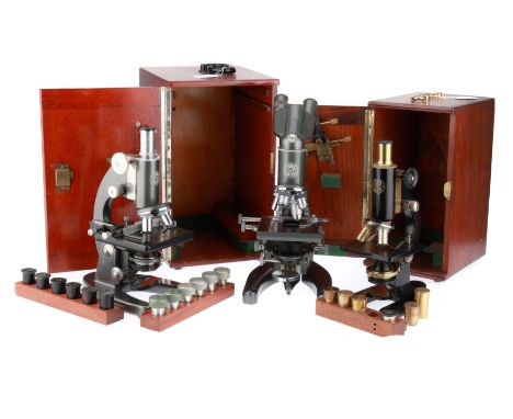 including a Baker microscope finished in grey in a polished case with accessories, another large Baker microscope finished in