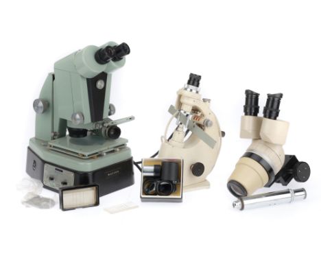 to include an Olympus Zoom microscope, a Watson Barnet binocular microscope, a Zeiss lens grinder, and other items.