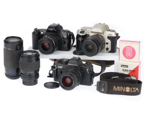 comprising a Nikon F60, powers up, takes a shot, a Canon EOS500, powers up, takes a shot, and a Praktica BX20, not firing, a 