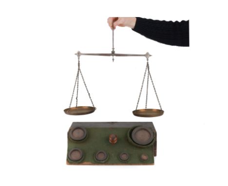 English, early 19th century, the steel beam with ovoid box ends and circular brass pans, with tray for six circular nesting w
