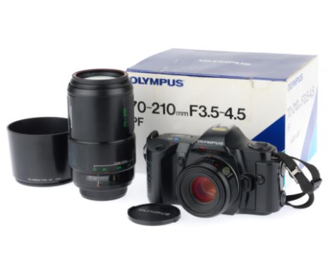 comprising an Olympus OM-101 body, powers up, shutter works, with a n f/1.8 50mm lens, barrel G, optics G, and a 70-210mm zoo