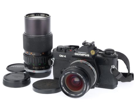 black, serial number 1024485, body G-VG, shutter works, meter responds to light, with a Zuiko f/2 24mm lens, barrel G, optics