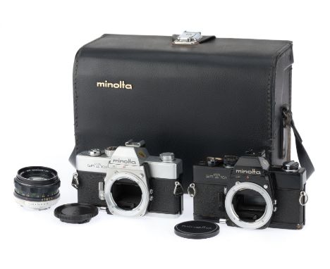 comprising serial number 1271859, black, body G, shutter works but sticks at slow speeds, serial number 2049184, silver, body