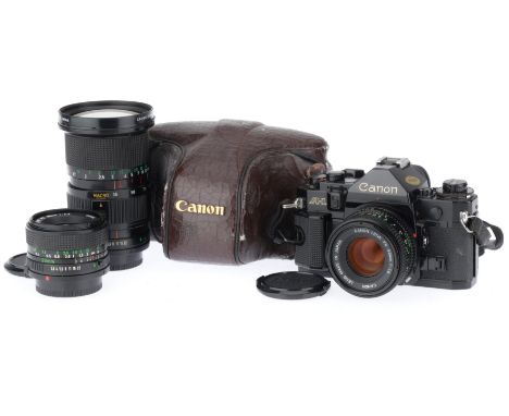 black, serial number 1474093, body VG, shutter works, viewfinder display works, metering responds to light, with a FD f/1.8 5