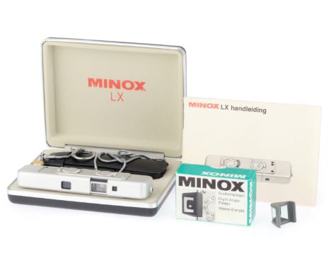 silver, body VG-E, advances correctly, controls operate, shutter clicks, in presentation case, VG, with case and battery hold