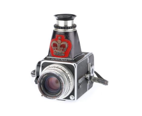 black, serial number TV46081, body G, shutter mechanism working, with a waist-level chimney finder which has been personalise
