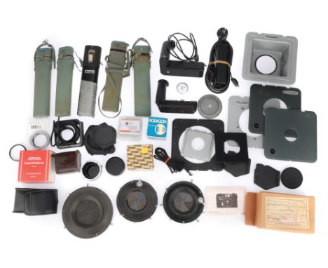 to include an Olympus OM winder, Nippon Kogaku battery holders, Nikon winder, a Movikon Cine Camera mainspring, MiLC lens ada