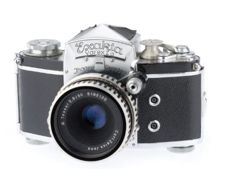 chrome, serial number 834905, body VG, shutter working, advance working, with a Carl Zeiss Jena Tessar  f/2.8 50mm lens, barr