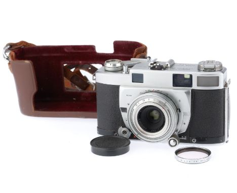 silver, serial number 105045, body VG, optics F-G, light haze, shutter works, with cap and half case.