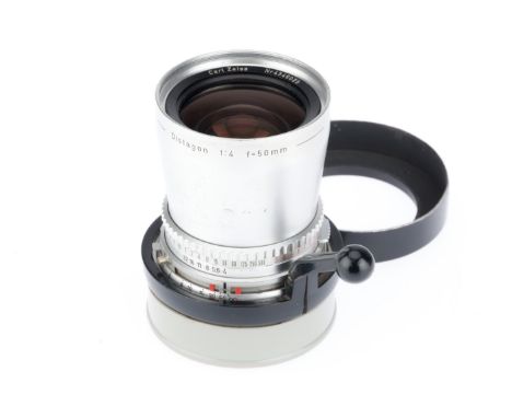 silver, serial number 4346029, barrel F-G with usage marks, shutter works, iris works, optics G, with rear cap and lens hood,