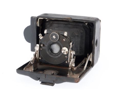 black, body F-G, viewfinder not closing properly, bellows opens and closes, shutter jammed.